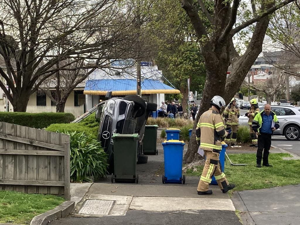 The Mercedes flipped after taking the roundabout at speed.Credit: Herald Sun