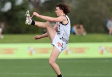 Oliver Hannaford kicks for goal during Greater Western Victoria Rebels' clash against Oakleigh Chargers in the Coates Talent League on August 18, 2024. Picture: AFL Photos