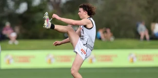 Oliver Hannaford kicks for goal during Greater Western Victoria Rebels' clash against Oakleigh Chargers in the Coates Talent League on August 18, 2024. Picture: AFL Photos