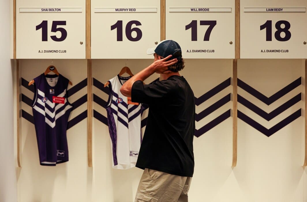 Murphy Reid in front of his new locker at Optus StadiumCredit: Fremantle.