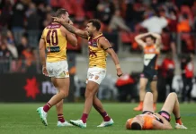 Callum Ah Chee celebrates the Lions' win. Credit: Getty Images