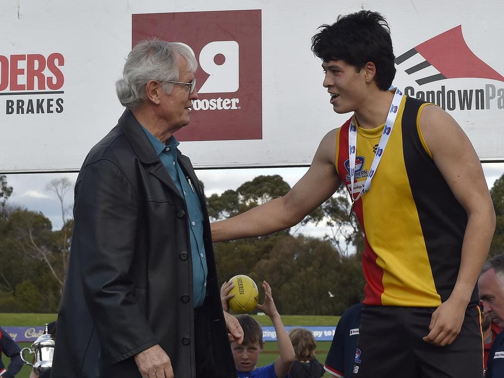 Lai accepts his best-on-ground grand final medal. Picture: Andrew Batsch