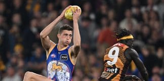 MELBOURNE, AUSTRALIA - MAY 26: Brandon Ryan of the Lions marks the ball during the round 11 AFL match between Hawthorn Hawks and Brisbane Lions at Marvel Stadium, on May 26, 2024, in Melbourne, Australia. (Photo by Daniel Pockett/Getty Images)