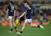 BRISBANE, AUSTRALIA - SEPTEMBER 07: Corey Durdin of the Blues warms up prior to the 2024 AFL First Elimination Final match between the Brisbane Lions and the Carlton Blues at The Gabba on September 07, 2024 in Brisbane, Australia. (Photo by Russell Freeman/AFL Photos via Getty Images)